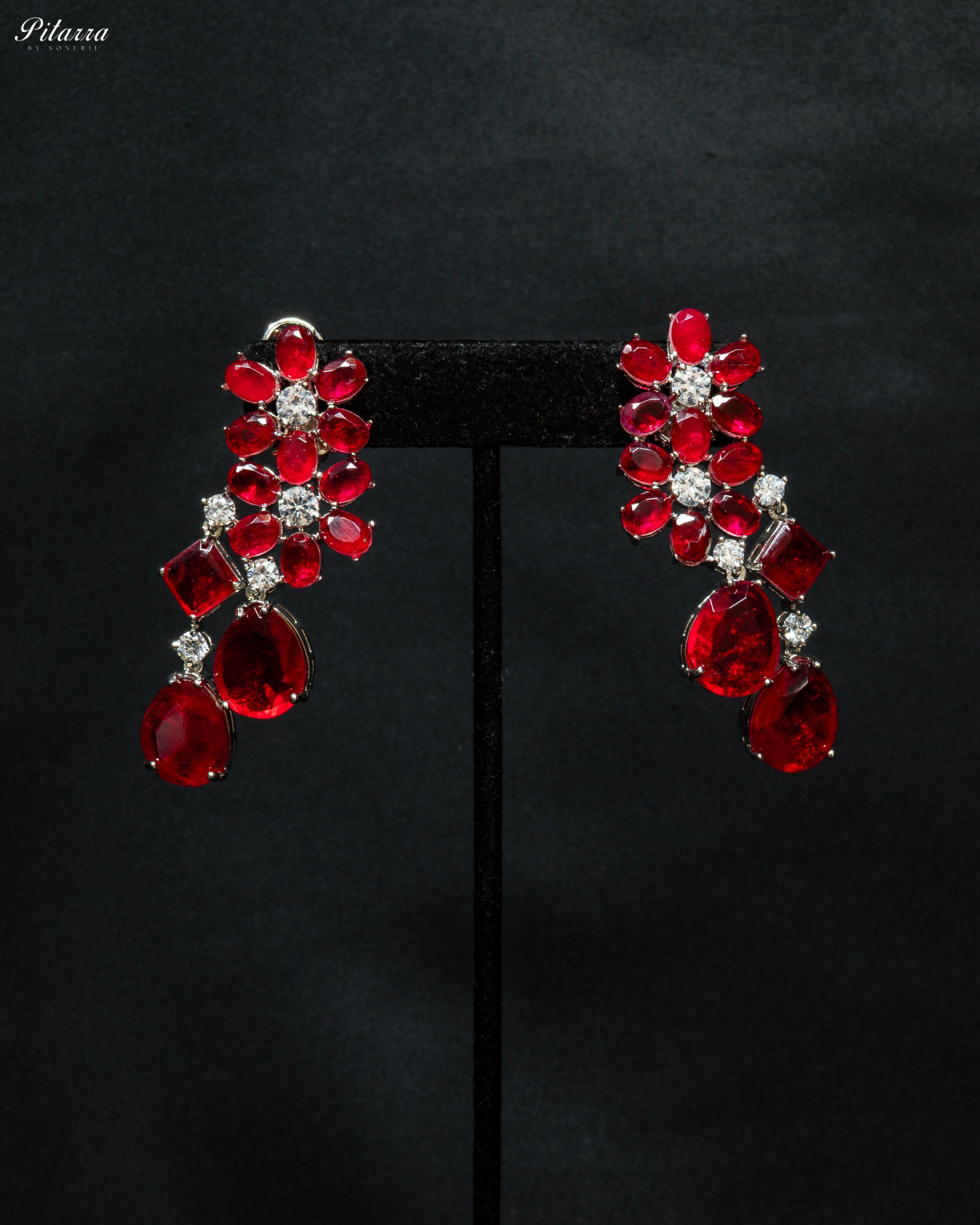 Silver Finish Red Crystal Dangler Earrings